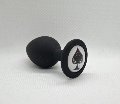 Czarny korek analny z motywem karty pik i kobiecej sylwetki w środku